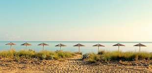 Stranden foran Ilion Beach