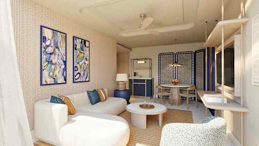 En moderne stue med beige sofa, fargerike veggmalerier og bord. (AI-generert tekst)