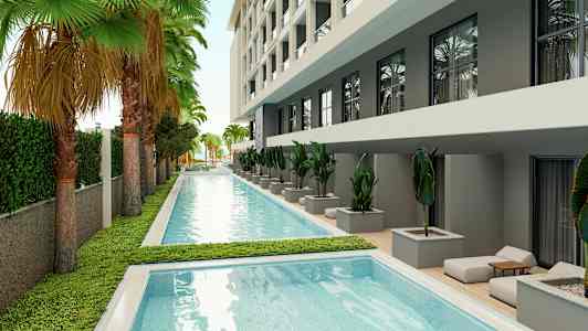 Et svømmebasseng omgitt av grøntområder og en moderne bygning. (AI-generert tekst)