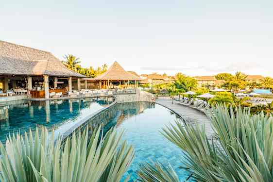 Vakkert hur på Mauritius omgitt av palmer