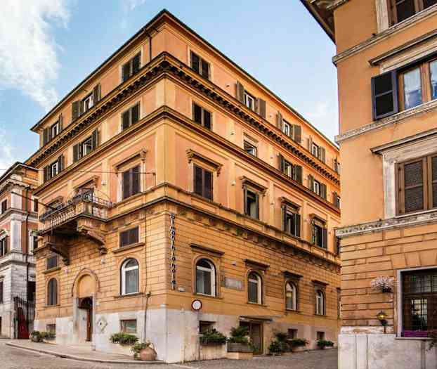 En boligblokk i bymiljø. (AI-generert tekst)