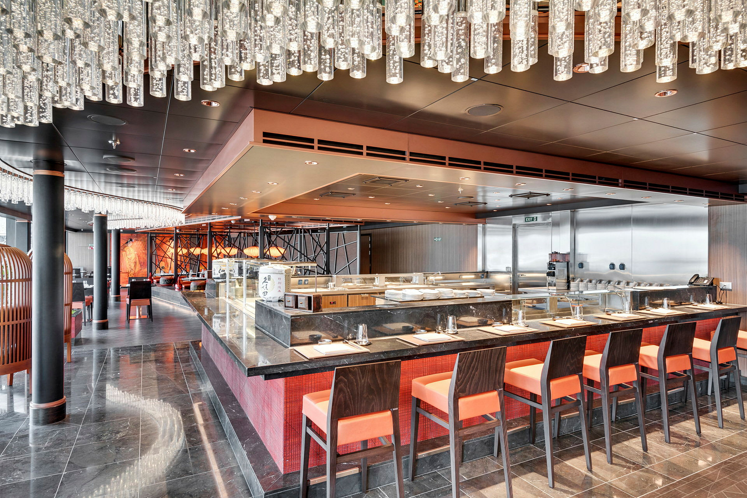 Interiør av en restaurant med sitteplasser ved en bardisk og et moderne design. (AI-generert tekst)