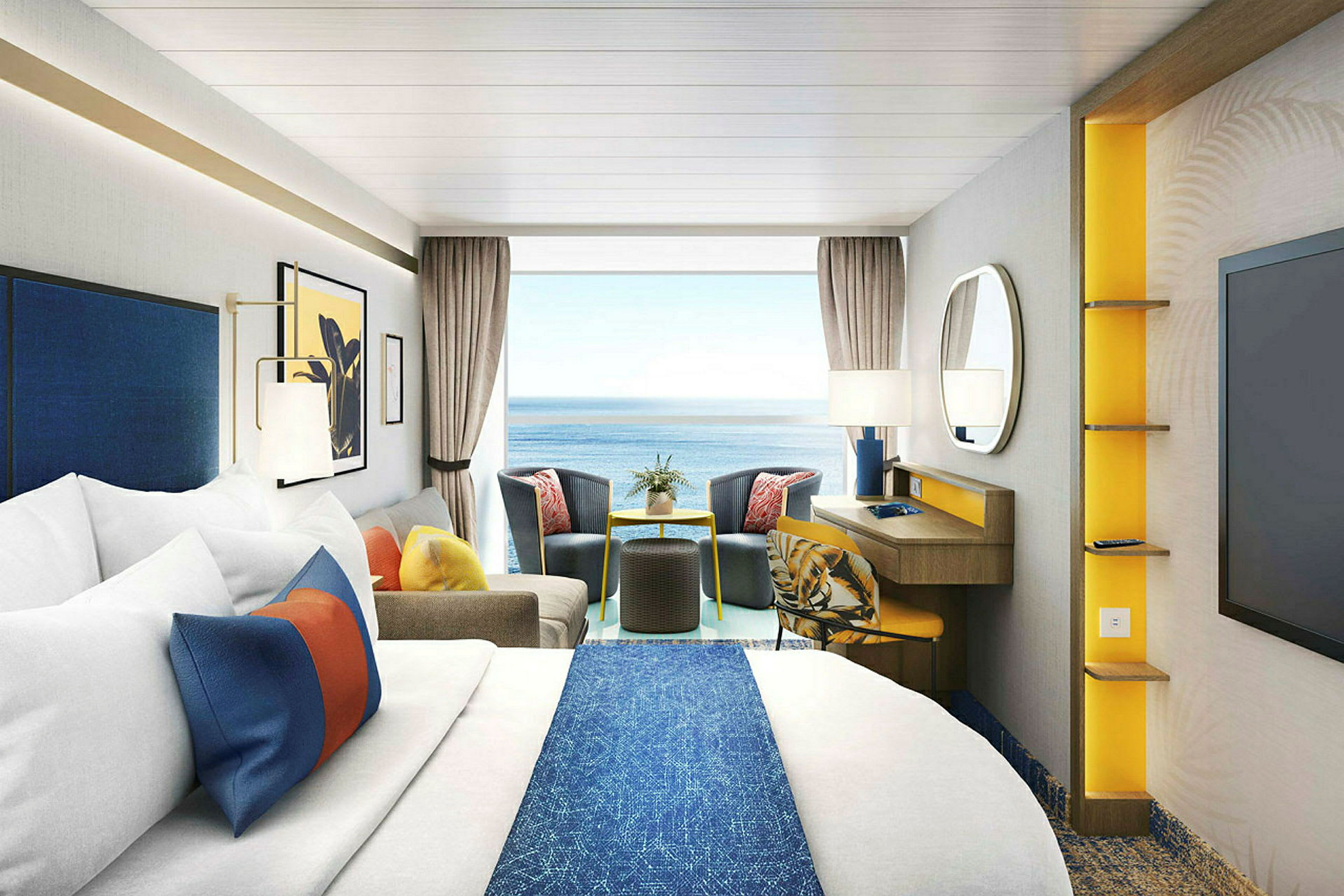 Moderne innredet hotellrom med seng, sofagruppe og havutsikt. (AI-generert tekst)
