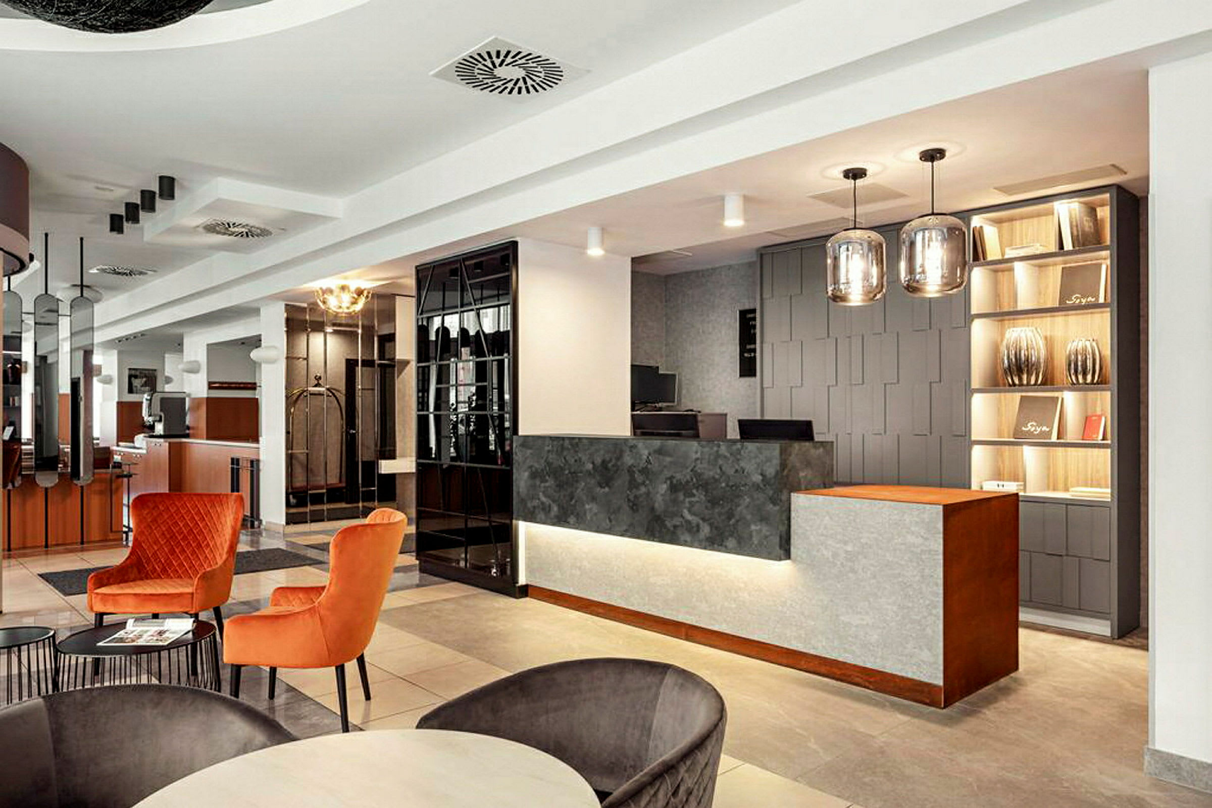 Resepsjonen på et hotell med en moderne og elegant innredning. (AI-generert tekst)