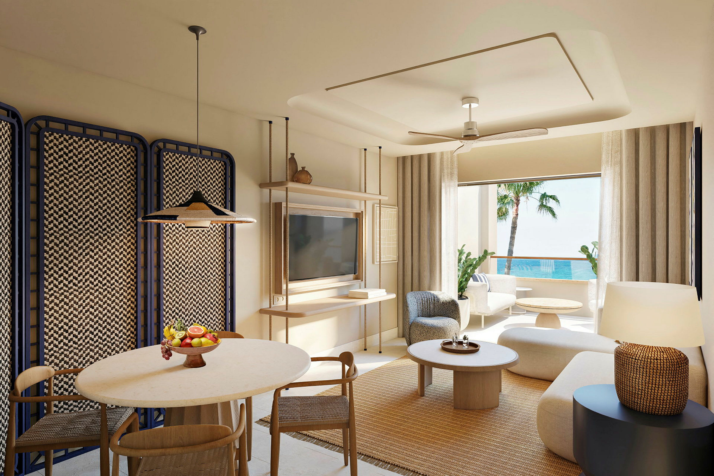 En moderne innredet hotellsuite med sittegruppe, spisebord og sjøutsikt. (AI-generert tekst)