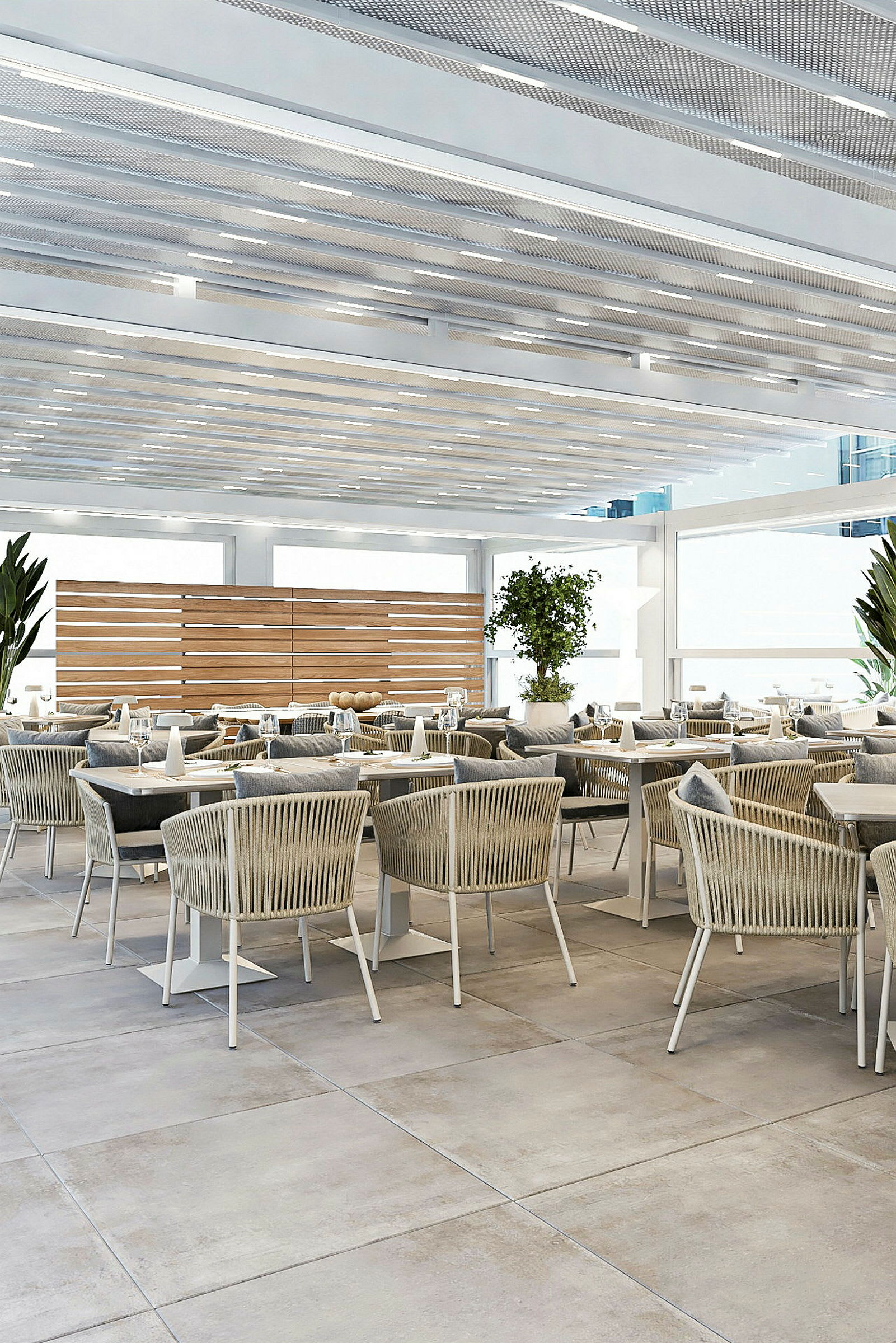 En moderne restaurant med komfortable stoler og bord plassert i et lyst og luftig interiør. (AI-generert tekst)