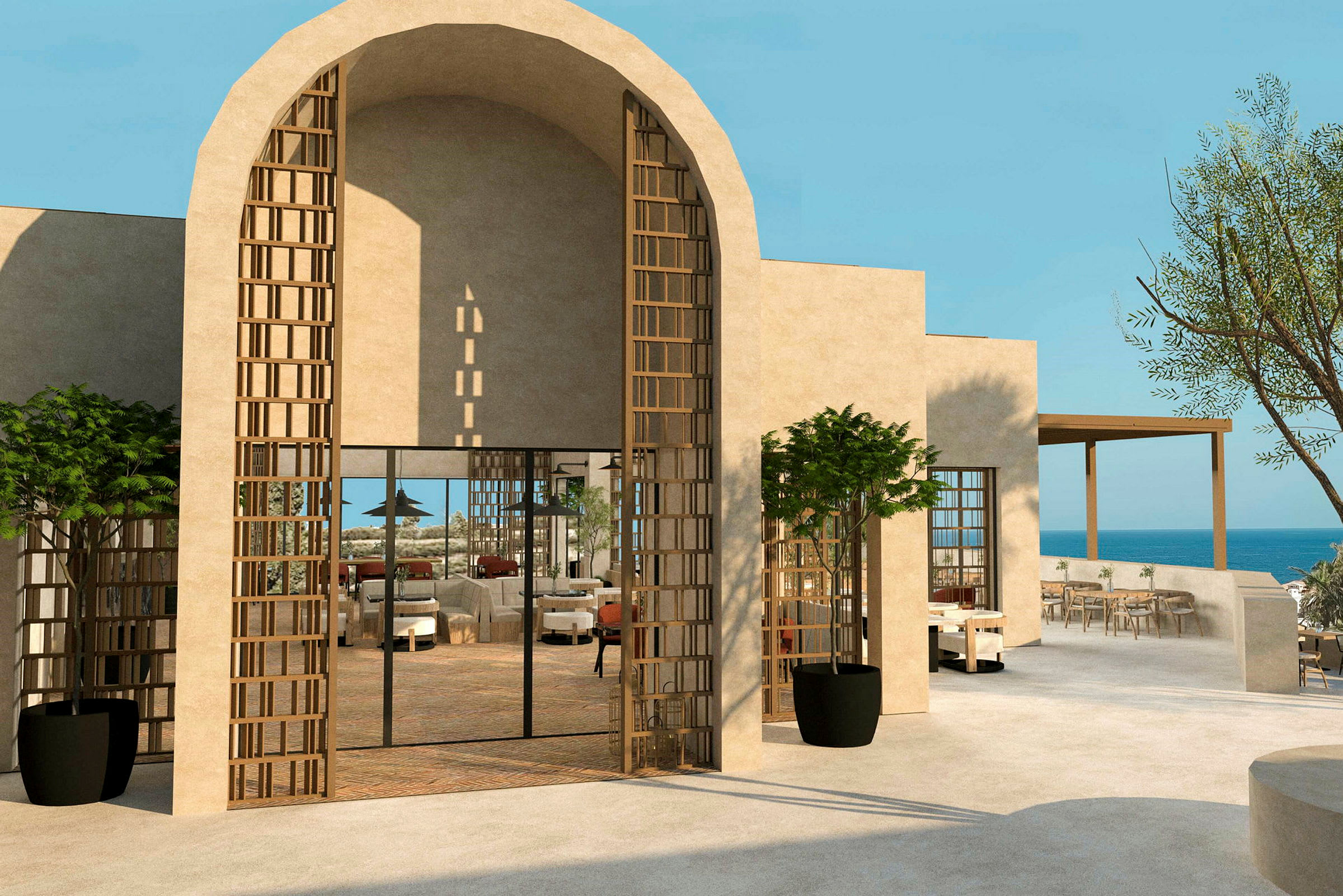En bygning med moderne arkitektoniske trekk, med en skyggelagt uteplass og utsikt over havet. (AI-generert tekst)