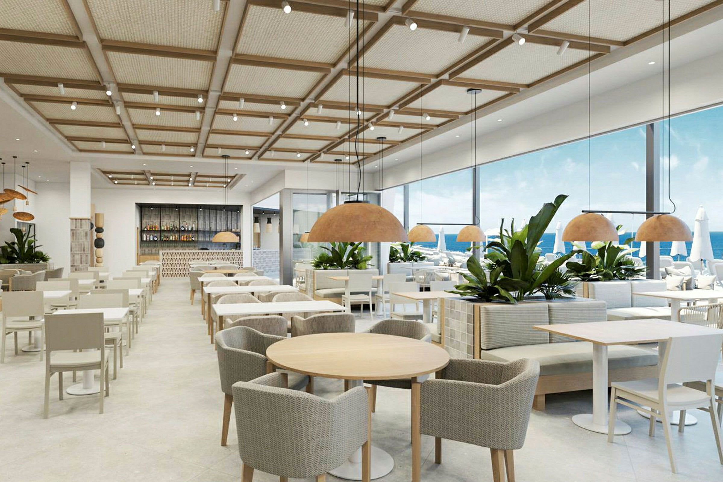 En restaurant med moderne innredning og store vinduer mot havet. (AI-generert tekst)