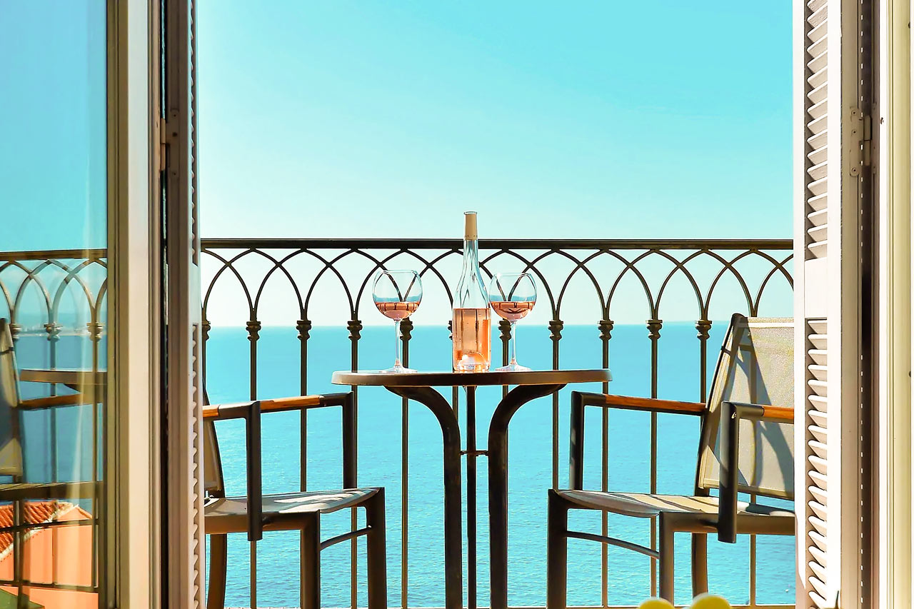 Dobbeltrom superior med balkong eller terrasse og havutsikt